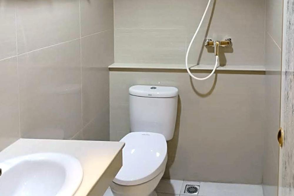 Twospaces Living At Maximus Inn Palembang Exterior photo