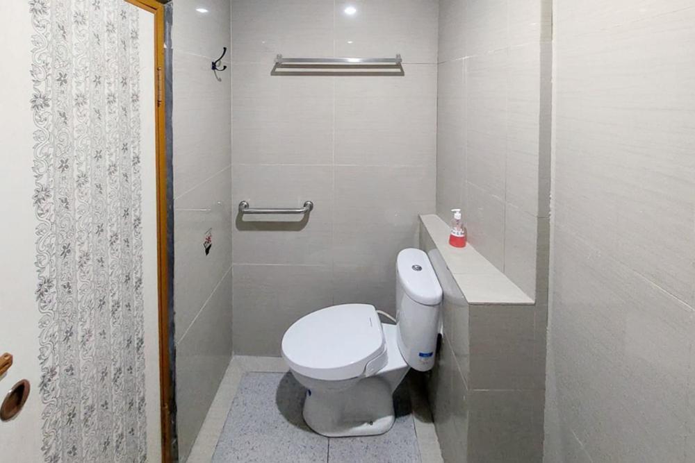 Twospaces Living At Maximus Inn Palembang Exterior photo